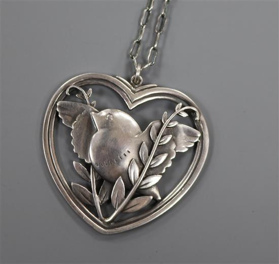 A Danish Georg Jensen sterling silver heart shaped robin and wheatsheaf pendant, no. 97